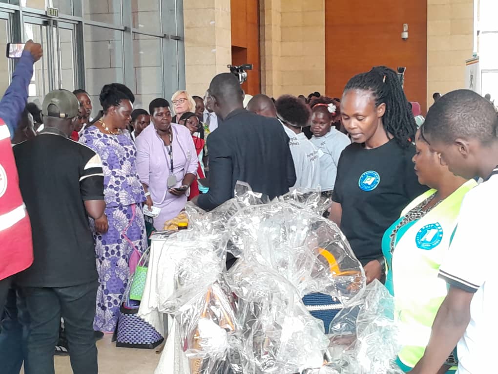 Visitors examining the products at the PhiphyMak stand