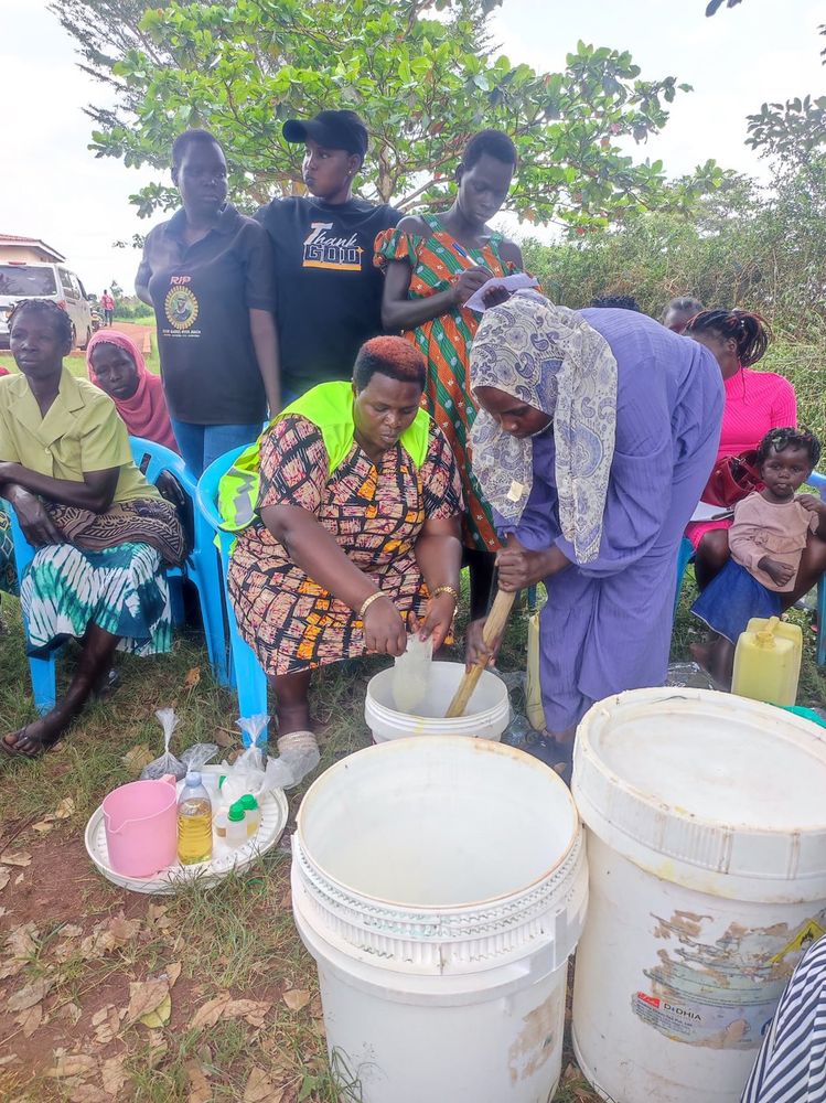 A demonstration of liquid soap making using buckets and basic materials