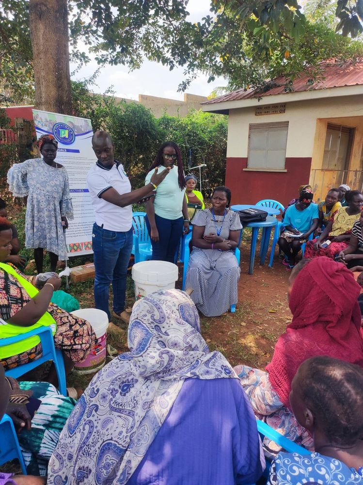 Women collecting materials at the close of a session