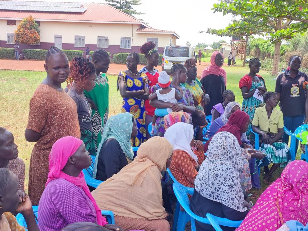 A crowd of women waiting to be attended to on the grounds
