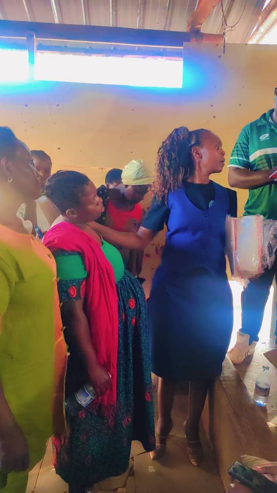 A mother and her child receiving support during the visit